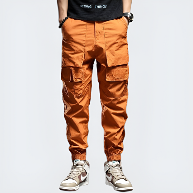 Orange techwear pants zipper fly closure