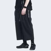 Unisex wearing cropped pants black