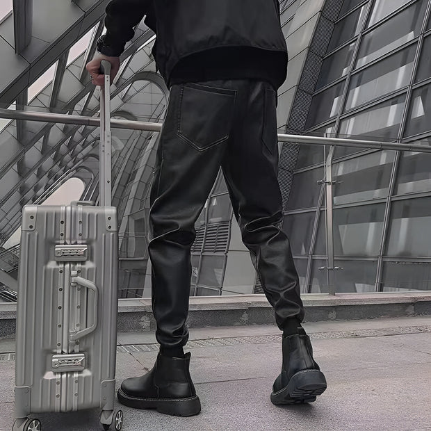 Unisex wearing black techwear waterproof pants drawstring closure