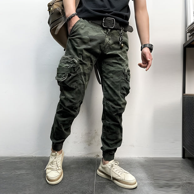 Man wearing green camo cargo pants baggy print design