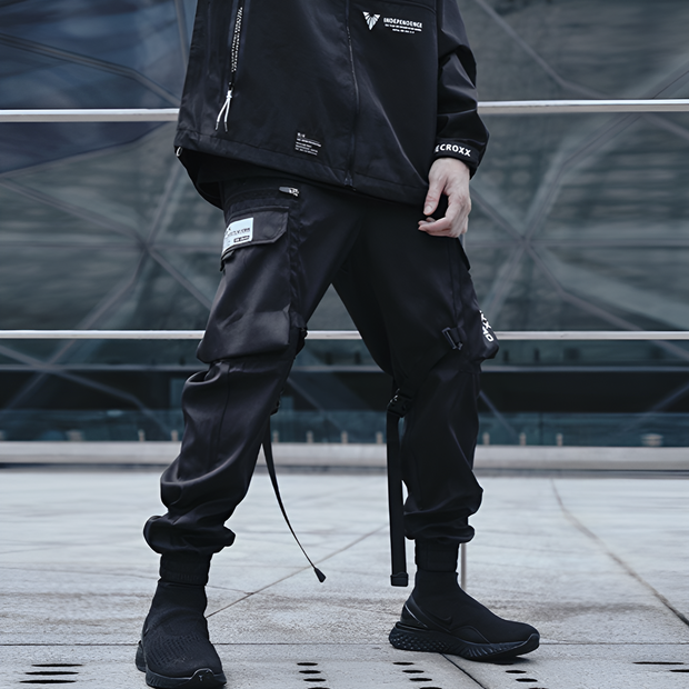 Black strapped cargo joggers unisex wearing