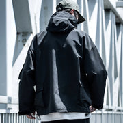 Man wearing black techwear zip up hoodie adjustable hood