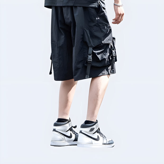 Dark reflective shorts from the back—clean lines and bold details that keep your look sharp from every angle.