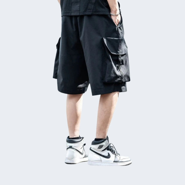 Command attention from every angle. These techwear-inspired cargo shorts feature a bold back view with functional pockets and a relaxed fit built for the street.