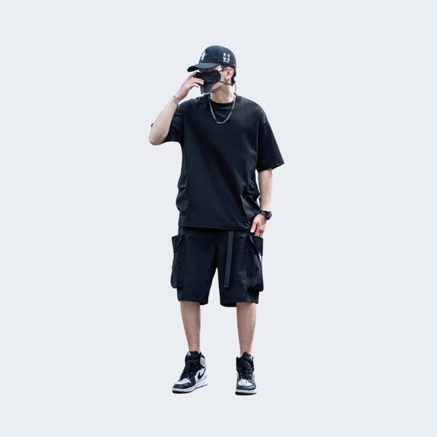 Step into the future of fashion with these oversized black cargo shorts. Designed for comfort and function, they blend techwear aesthetics with everyday practicality. Perfect for a bold, urban look.