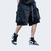 Show off the sleek, tactical side profile with these baggy black cargo shorts. A perfect blend of urban style and utility, made for movement and attitude.