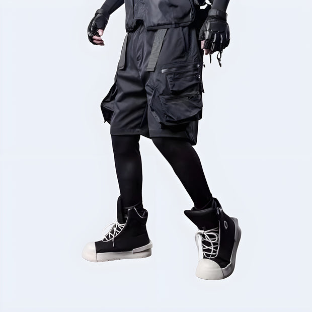 Man wearing Techwear UK hidden pocket cargo shorts back side view – tactical streetwear shorts with discreet storage, modern techwear style for urban fashion and summer functionality.