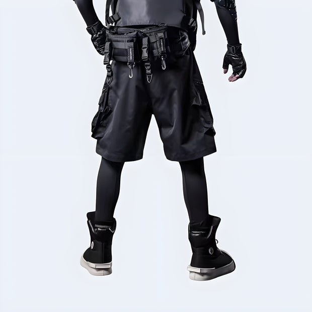 Techwear UK hidden pocket cargo shorts back view – man wearing functional black streetwear shorts with concealed pockets, perfect for urban utility, summer fashion, and techwear outfits.