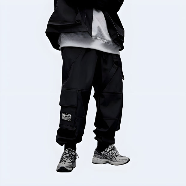 Man wearing big pocket techwear baggy pants multiple pockets both sides