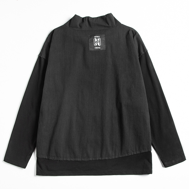 Unisex wearing black techwear sweatshirt