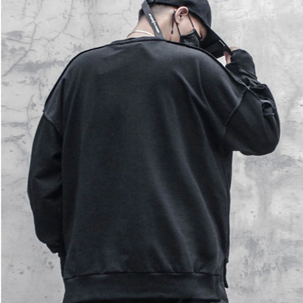 Man wearing black cyberpunk sweater