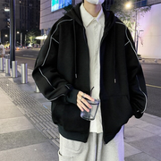 Man wearing hoodie with reflective stripes adjustable hoodie