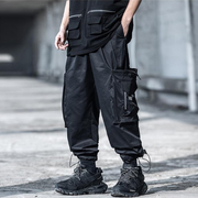 Man wearing black pants baggy large pockets of both sides