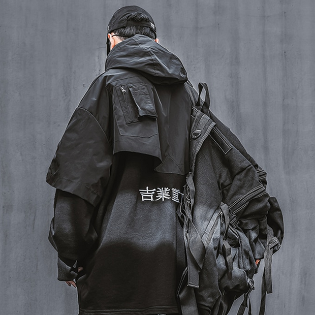 Man wearing black techwear hoodie double layered decoration