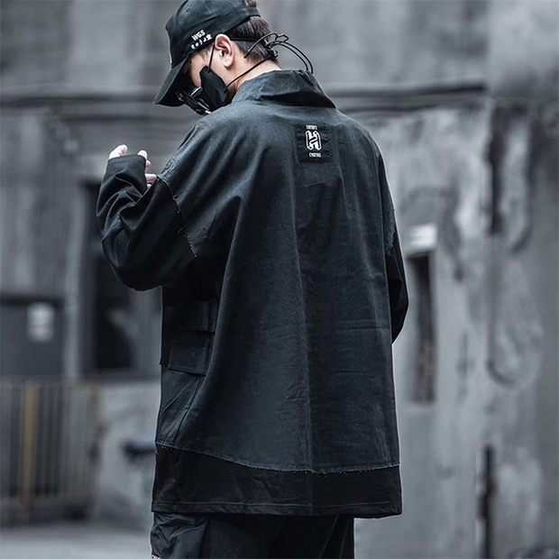 Man wearing black techwear sweatshirt japanese kanji print