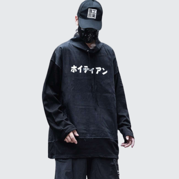 Man wearing black techwear sweatshirt adjustable hood
