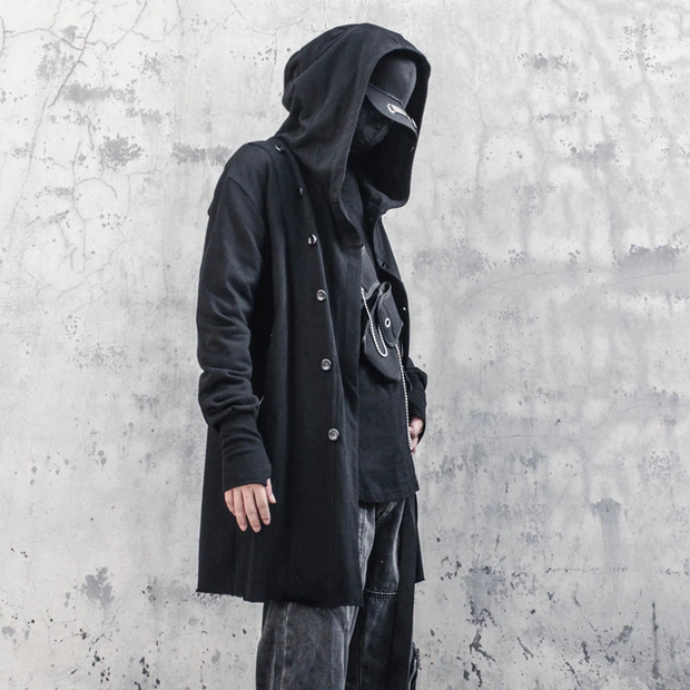 Man wearing black techwear trench coat comes with hood