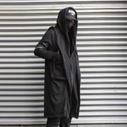 Man wearing black trench coat multiple pockets decoration