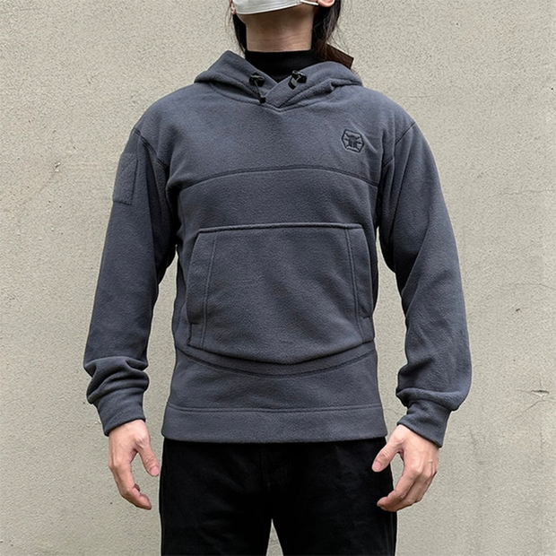 Man wearing grey tactical pullover hoodie adjustable hood
