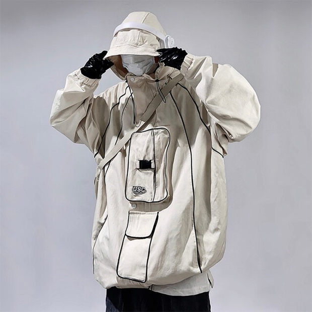 Man wearing oversized white tactical poncho hoodie style