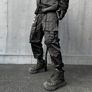 Unisex wearing black paratrooper cargo pants 