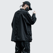 Man wearing black htgy jacket multiple pockets decoration