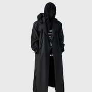 Man wearing black long techwear coat zipper closure