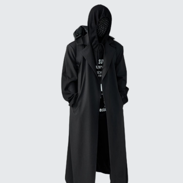 Man wearing black long techwear coat zipper closure