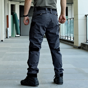 Unisex wearing grey tactical pants waterproof thigh side pocket