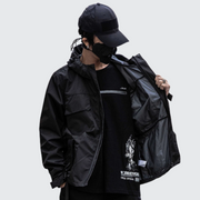 Man wearing black hooded cargo jacket zipper closure