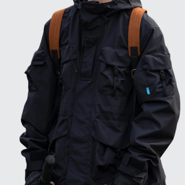 Man wearing black travel jacket with pockets zipper closure